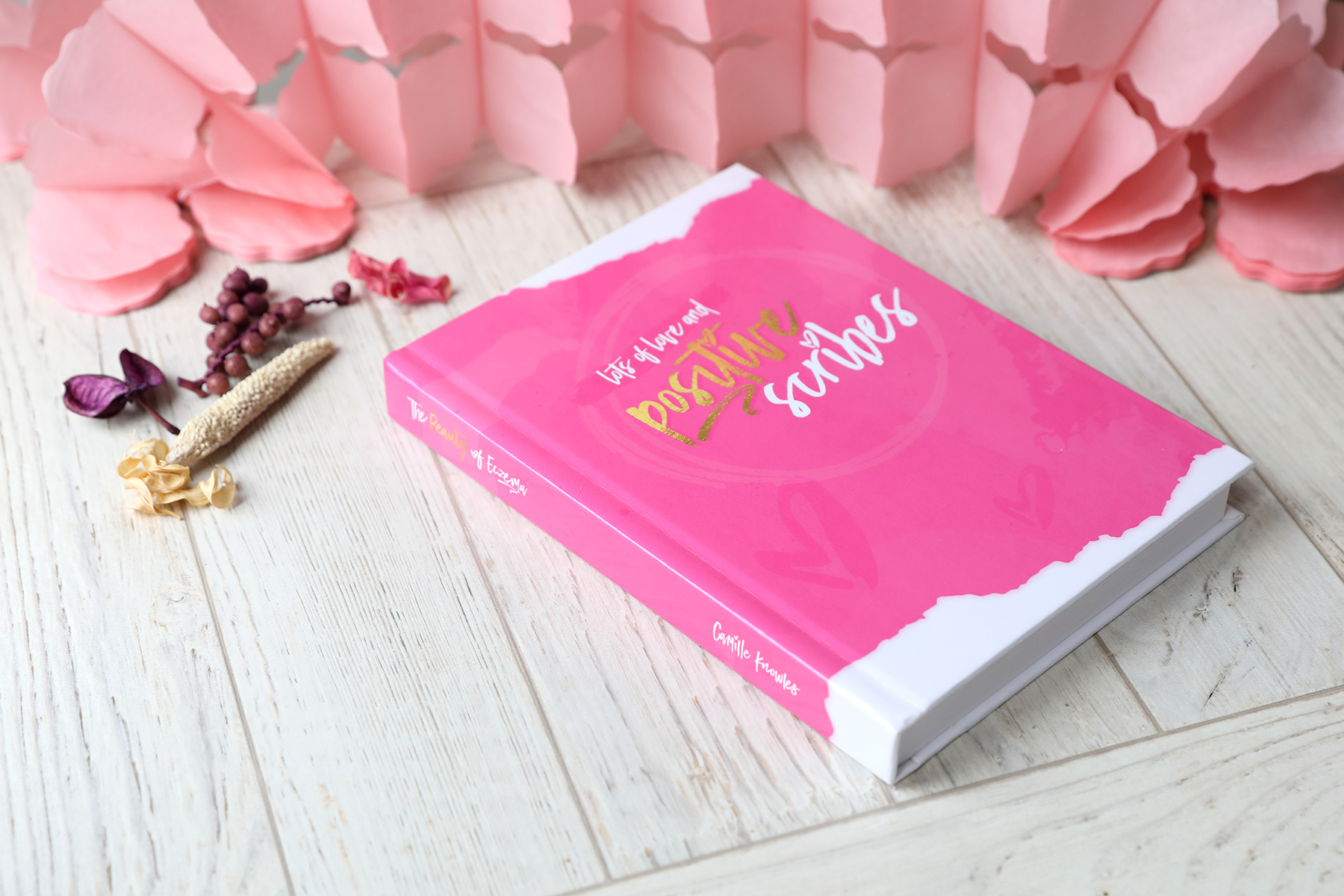 The pink Write It Now and Positive Scribes journal